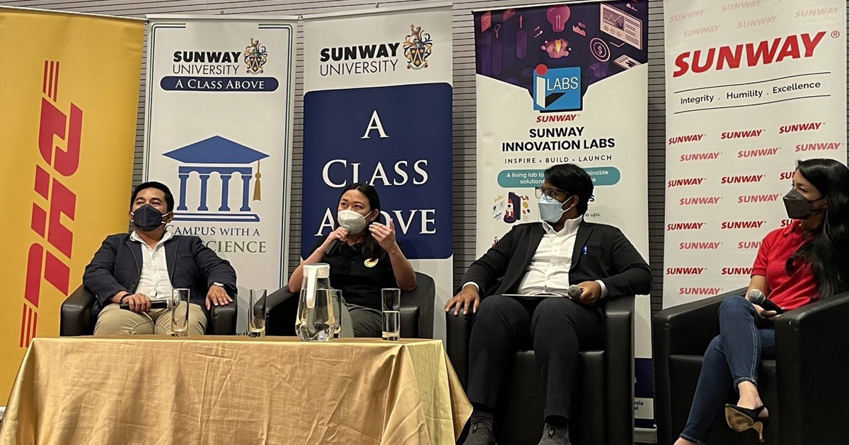 From left to right: Sunway Centre for Planetary Health Chief Planetary Health Scientist Dr Renzo Guinto, DHL Express Malaysia Head of Business Transformation Liew Hun Ni, Disruptr Founder and Editor Poovenraj Kanaraj and Sunway Property Head of Research and Analytics Christine Chong Oelofse. These people are sitting for the panel session of Make It Challenge 2022, at the forefront of buntings of Sunway University, Sunway Group, Sunway iLabs and DHL.
