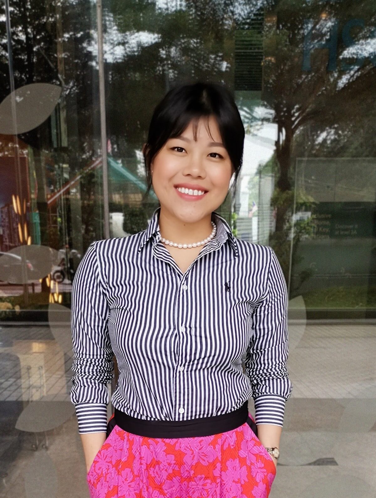 Chanratanak Rong, assistant director of group marcomms at Sunway Healthcare Group posing for the camera