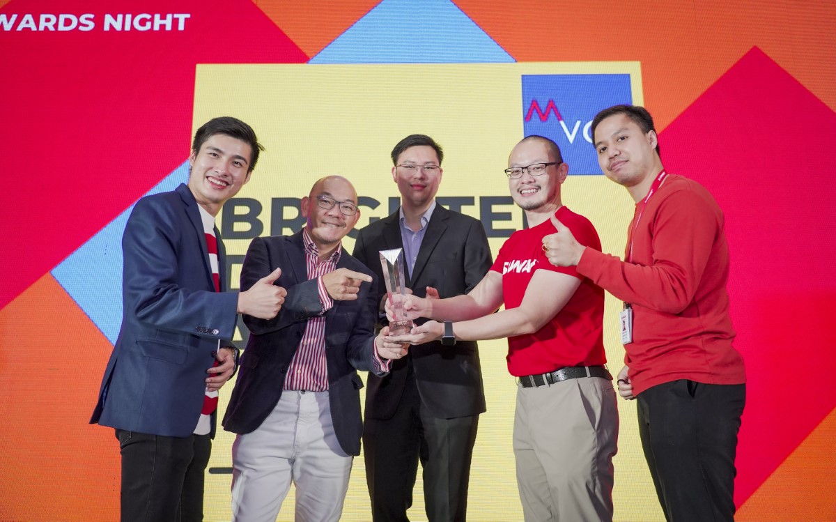 A medium landscape shot of Sunway iLabs representatives receiving the prestigious Malaysian Venture Capital and Private Equity Association (MVCA) Awards