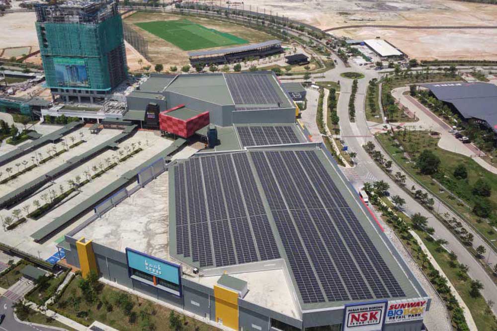 A drone shot of the solar panels on top of Sunway Big Box Retail Park at Sunway City Iskandar Puteri