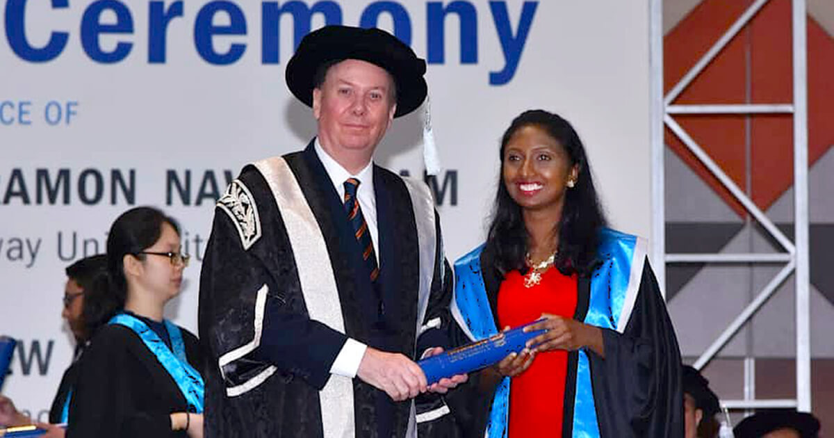 Mid-shot of Pro-Chancellor Professor Graeme Wilkinson and Regina Shantini
