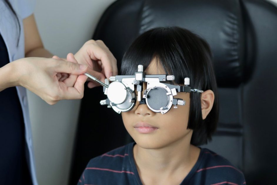 Girl undergoing eye test