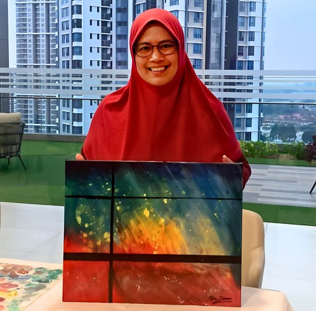 Mid shot of a Sunway Sanctuary resident holding a canvas